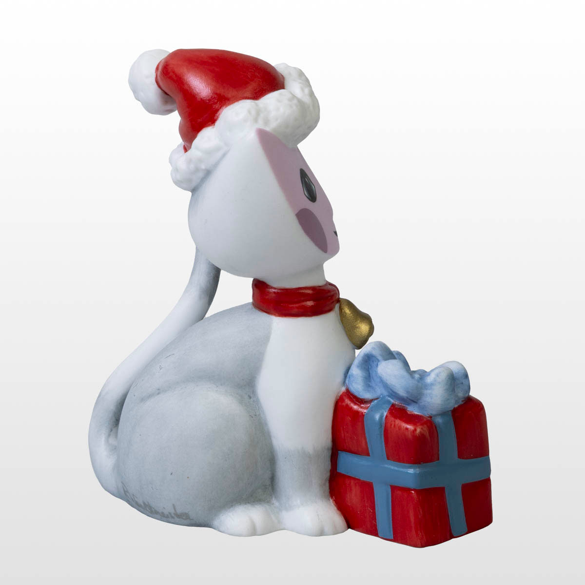Porcelain figurine by Rosina Wachtmeister: Pino and his Santa Claus hat (back right profile view)