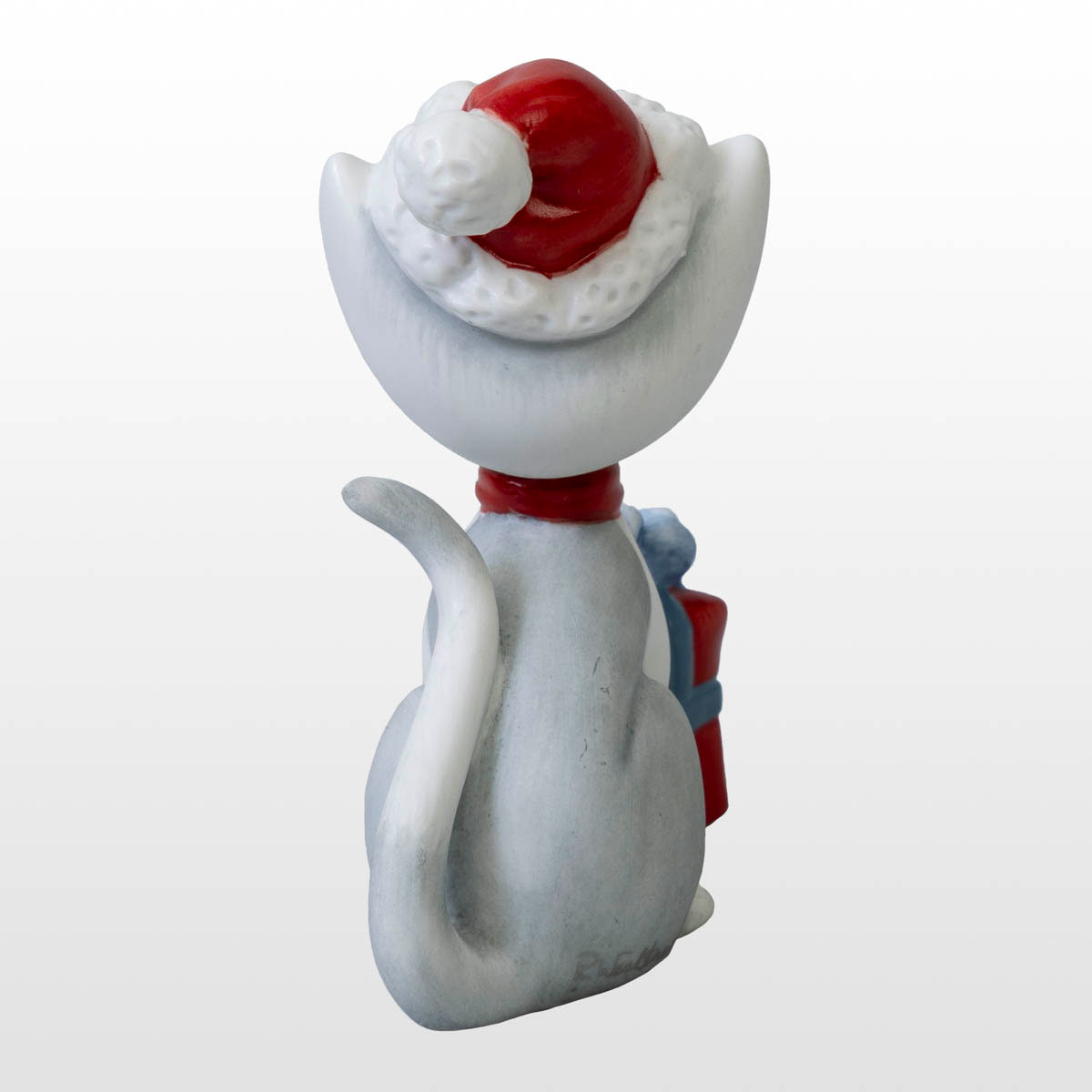 Porcelain figurine by Rosina Wachtmeister: Pino and his Santa Claus hat (back view)