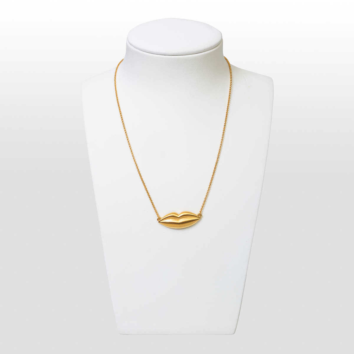 Pendant inspired by Salvador Dali: Lips gold (on a bust)