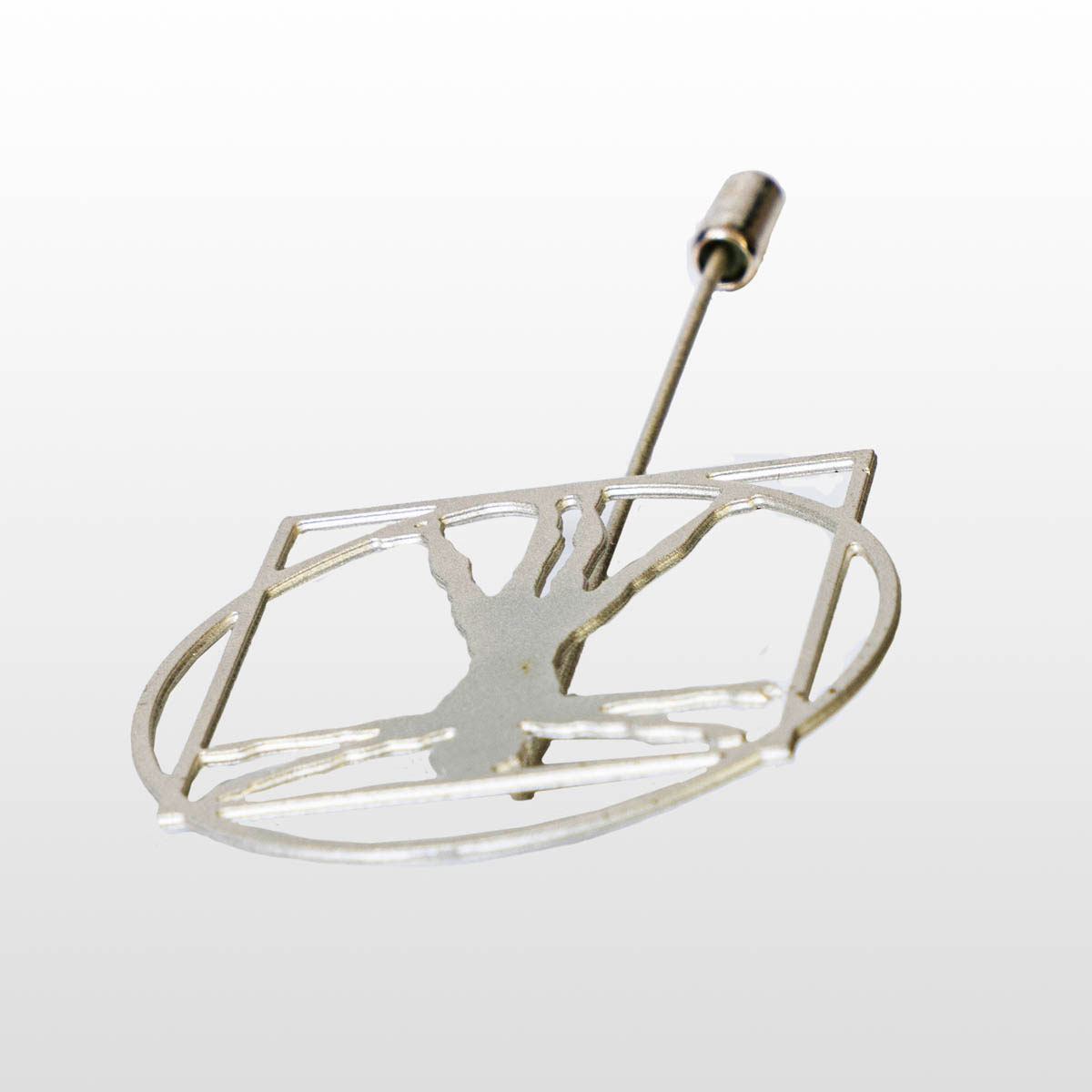 Spilla di Leonardo da Vinci: L'uomo vitruviano (dettaglio 1)